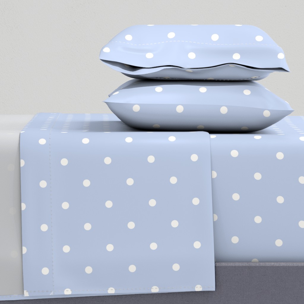 white small polka dots on pastel blue