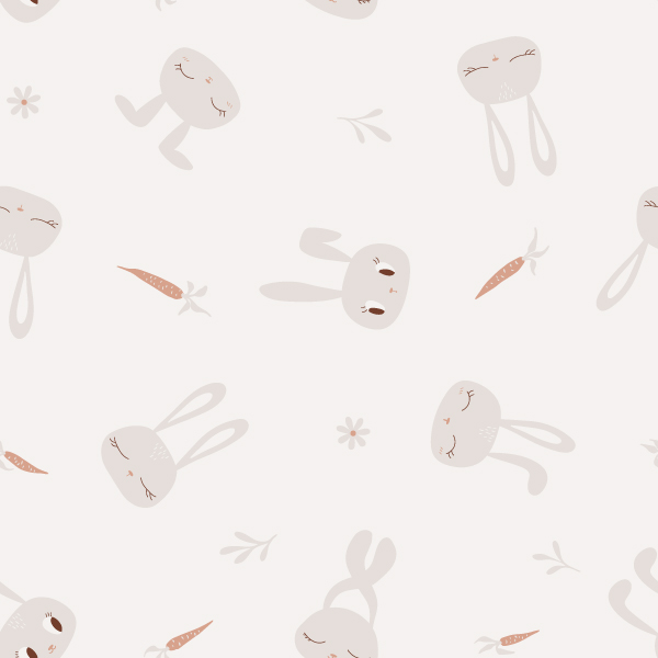 seamless pattern with cute bunny heads tossed with carrots