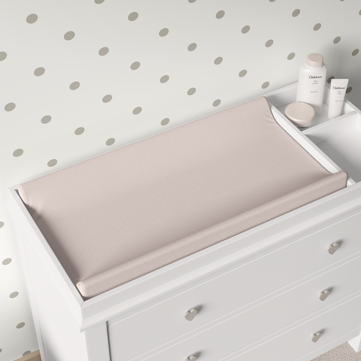 minimalist polka dot wallpaper in nursery room