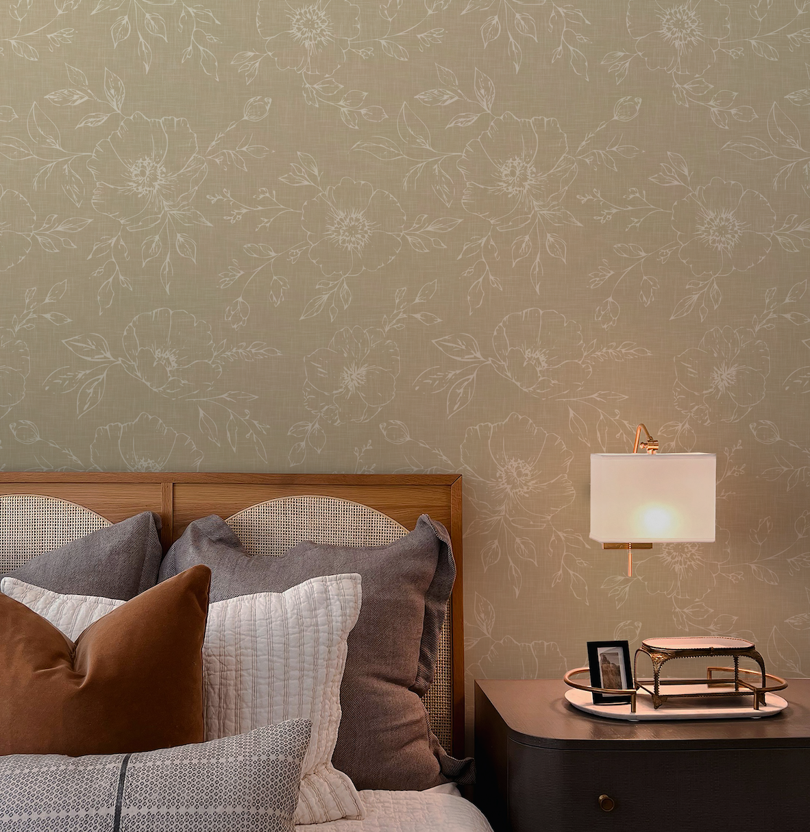 delicate sketched flowers on beige wallpaper